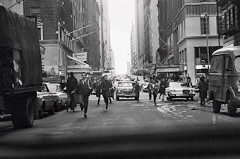 caption: "The crowds chasing us in <em>A Hard Day's Night </em>were based on moments like this," McCartney writes. "Taken out of the back of our car on West Fifty-Eighth, crossing the Avenue of the Americas."