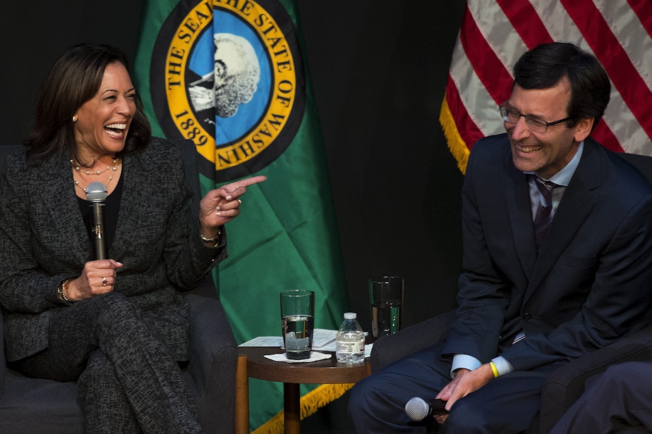 caption: Senator Kamala Harris laughs with Washington state Attorney General Bob Ferguson during a gun safety roundtable on Friday, September 27, 2019, at Langston Hughes Performing Arts Institute in Seattle.