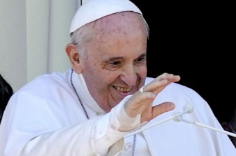 caption: Pope Francis appears on a balcony of the Agostino Gemelli Polyclinic in Rome, where he was recovering from intestinal surgery, for the traditional Sunday blessing and Angelus prayer on July 11, 2021. Pope Francis left the hospital Wednesday to continue his convalescence at the Vatican.