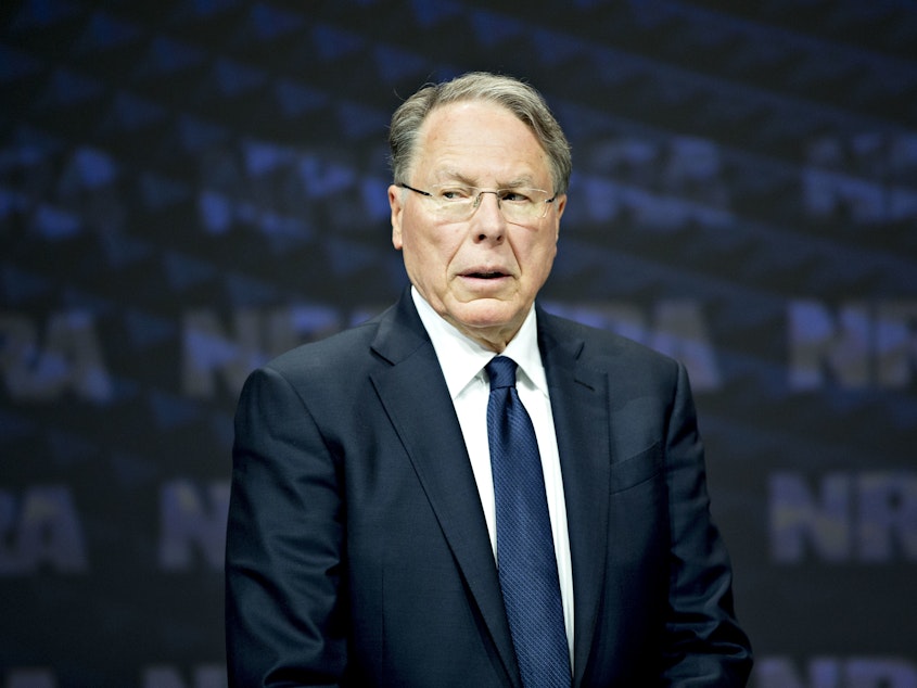 caption: NRA CEO Wayne LaPierre stands onstage at the NRA annual meeting in Dallas on May 5, 2018. The New York attorney general announced Thursday she will launch a civil action to dissolve the association.