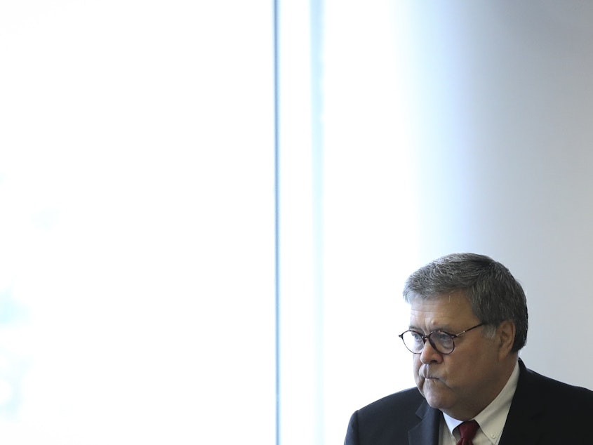 caption: U.S. Attorney General William Barr declared in July that the Justice Department intended to resume carrying out the death penalty — though those plans are on hold after a federal court decision Wednesday.