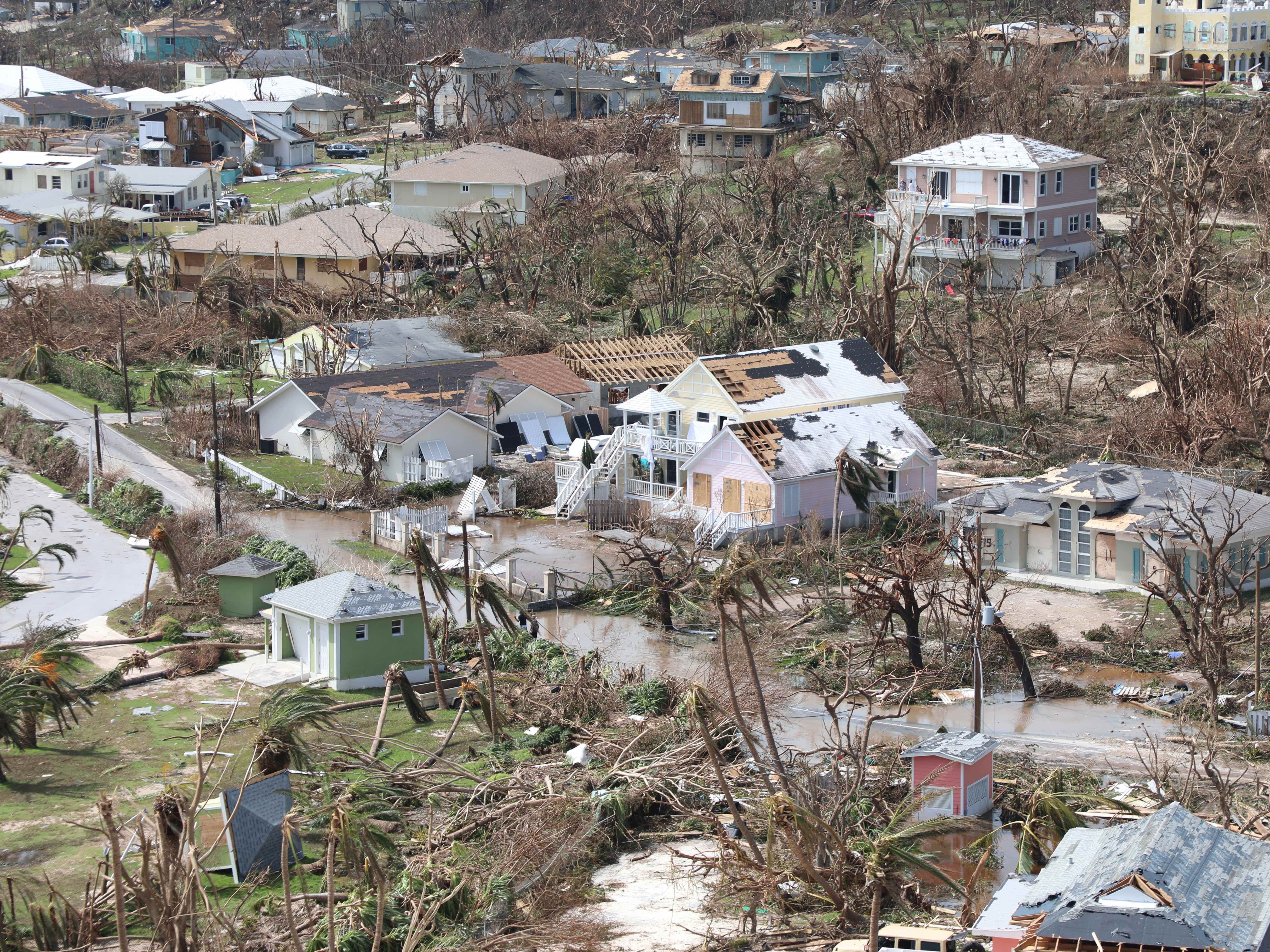 caption: The destruction caused by Hurricane Dorian is seen from the air in Marsh Harbour on the Bahamas' Great Abaco Island. The death toll from the hurricane, officially at 20, is expected to climb.