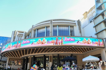 caption: The marquee at The Grove theater in Los Angeles announces the opening of <em>Barbie</em> in July 2023.