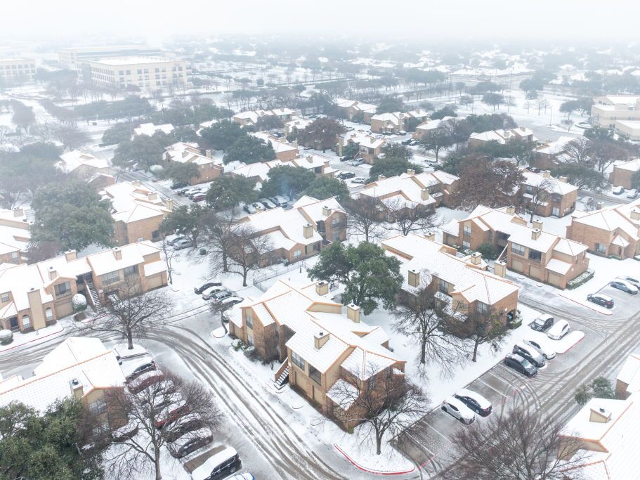 caption: Snow fell across northern Texas, including in Plano, Texas, Thursday as a major winter storm began moving across the southern U.S.