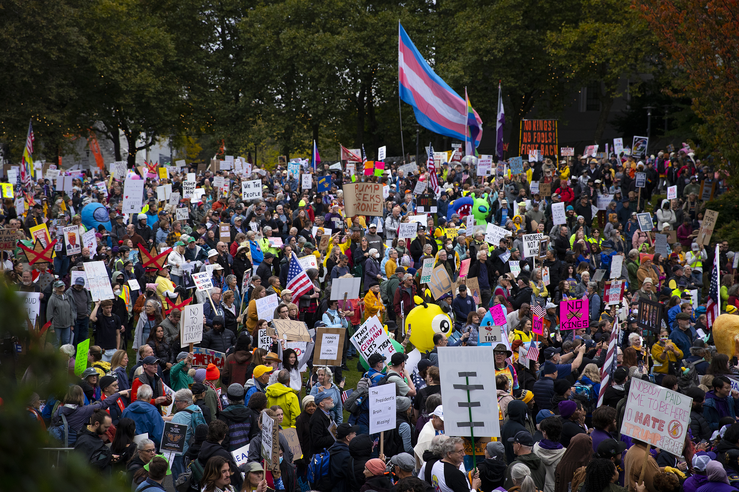 caption: Thousands of protesters gathered for the No Kings rally and march on Saturday, October 18, 2025, at Seattle Center. 