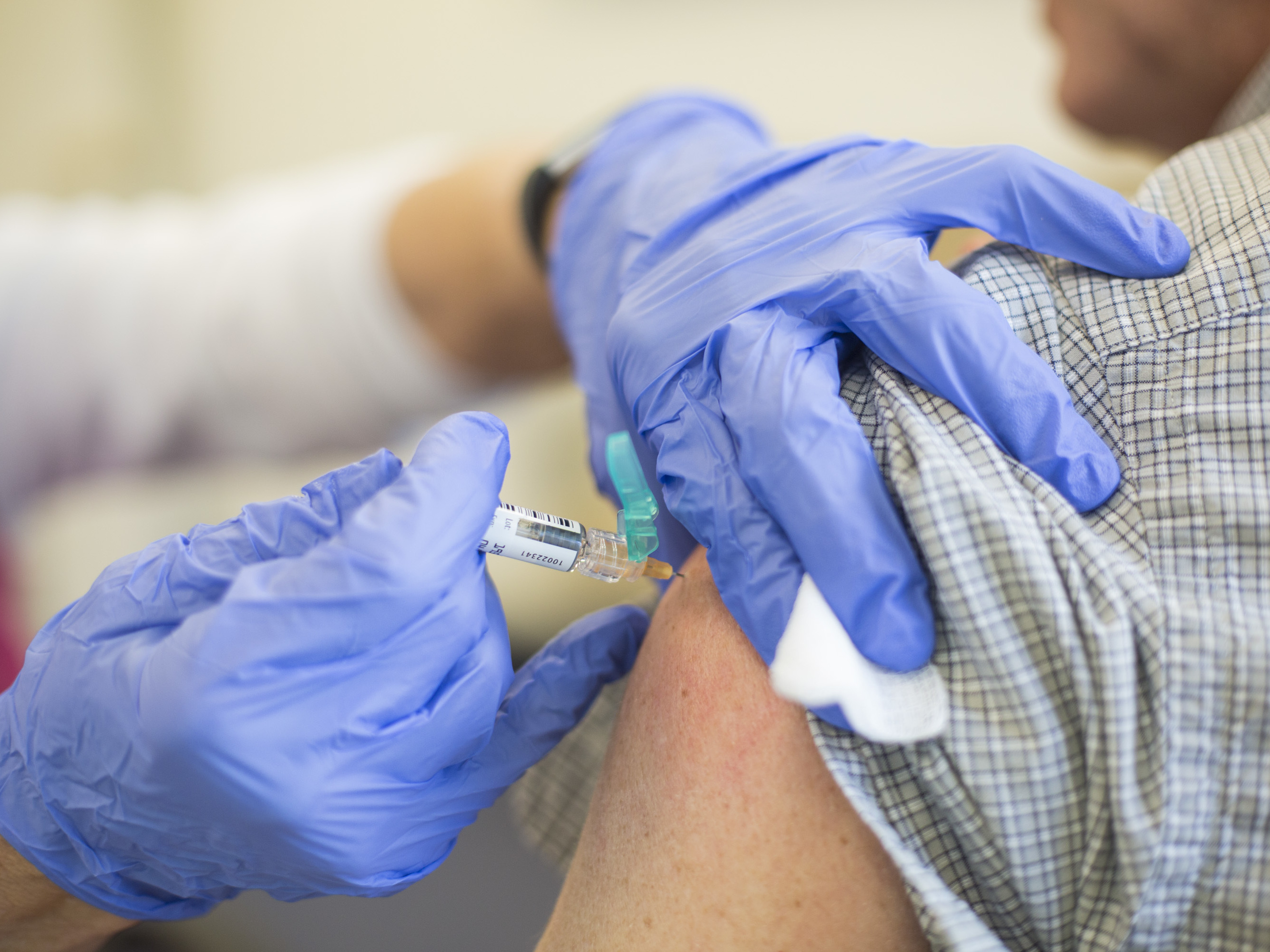 caption: Being overweight or obese can diminish the effectiveness of a flu shot, researchers say.