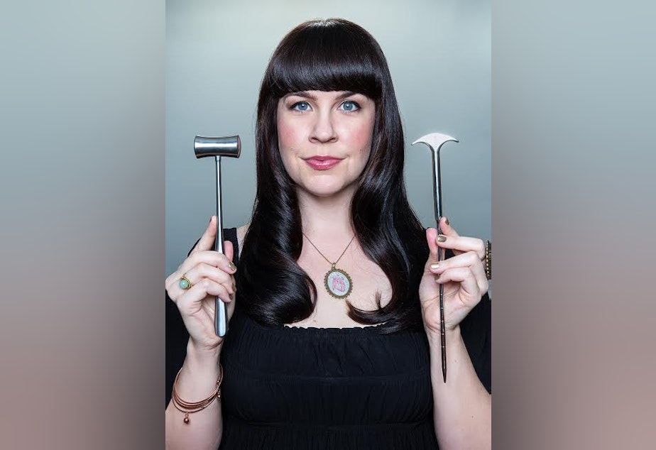 caption: Mortician Caitlin Doughty, with some tools of the trade.