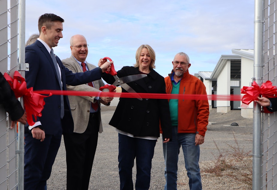 Dignitaries cut the ribbon at the grand opening of Bitmain's new East Wenatchee bitcoin mine -- in other words, a data center that earns cryptocurrency.