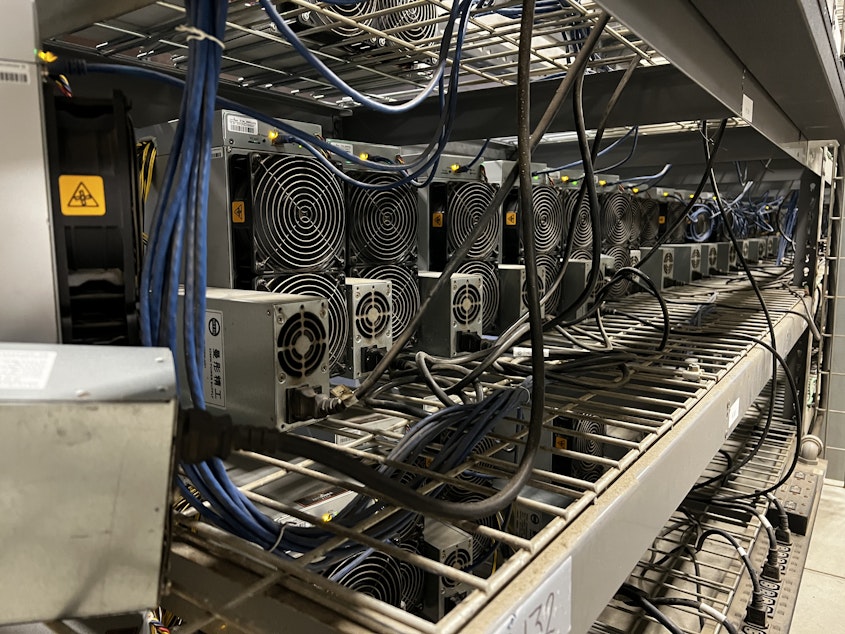 caption: These crypto servers run constantly, attempting to validate transactions on the blockchain. Salcido runs 8,000 servers at this Pangborn site. 