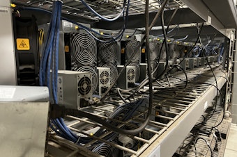 caption: These crypto servers run constantly, attempting to validate transactions on the blockchain. Salcido runs 8,000 servers at this Pangborn site. 