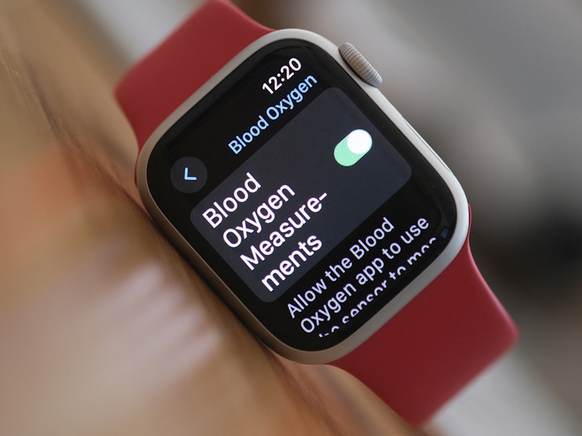 caption: Apple says the ability to measure blood oxygen levels will no longer be available on the Apple Watch Series 9 and Watch Ultra 2 models, after the tech giant's loss in a patent case.
