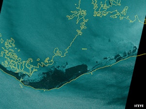 caption: An satellite image from the company ICEYE shows flooding on Grand Bahama on Monday. The satellite uses radar to look through the clouds.