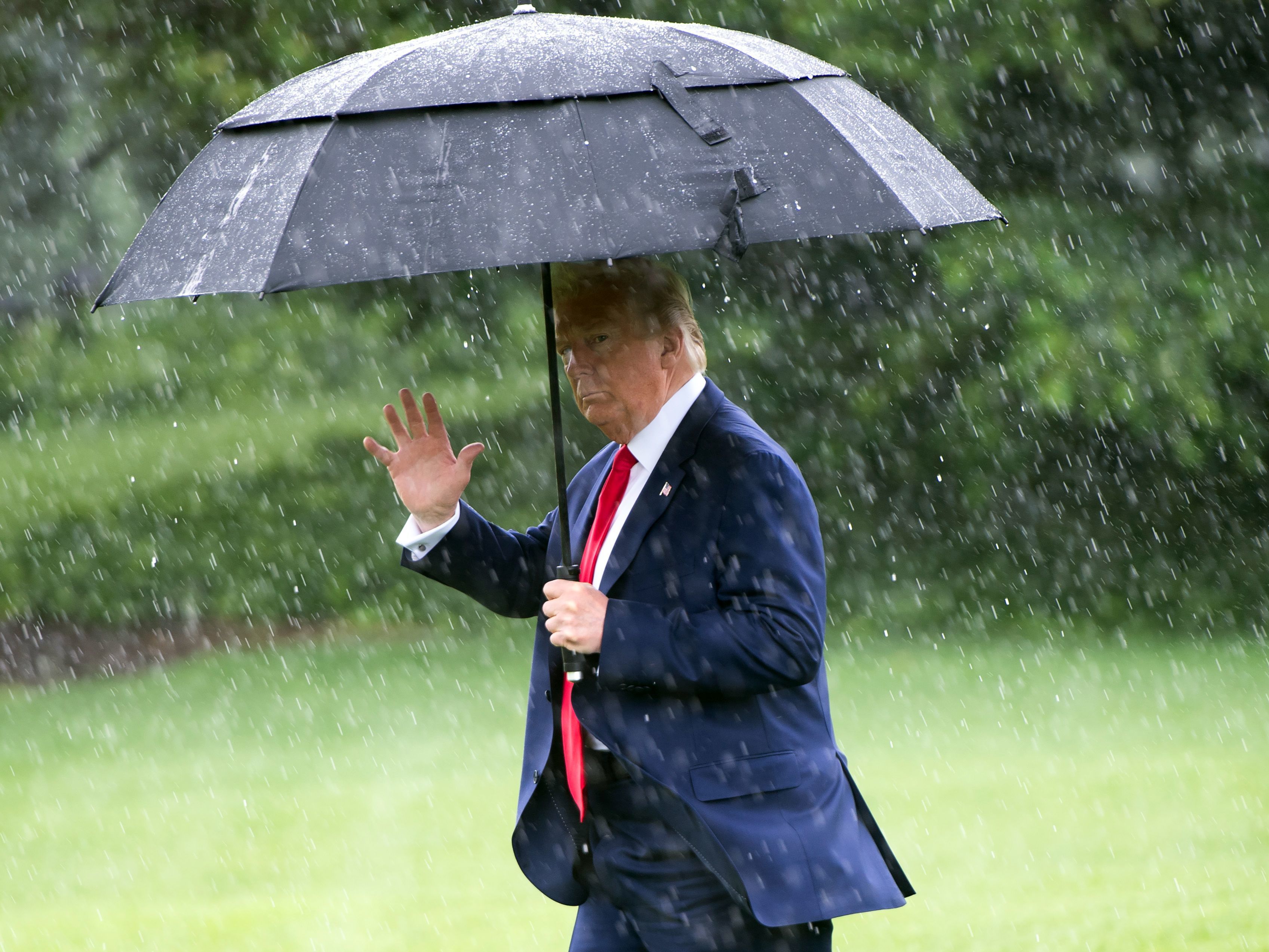 caption: While on the campaign trail, President Trump, seen here on the South Lawn of the White House in June, frequently bemoaned what he viewed as insufficient water pressure of devices like showerheads.
