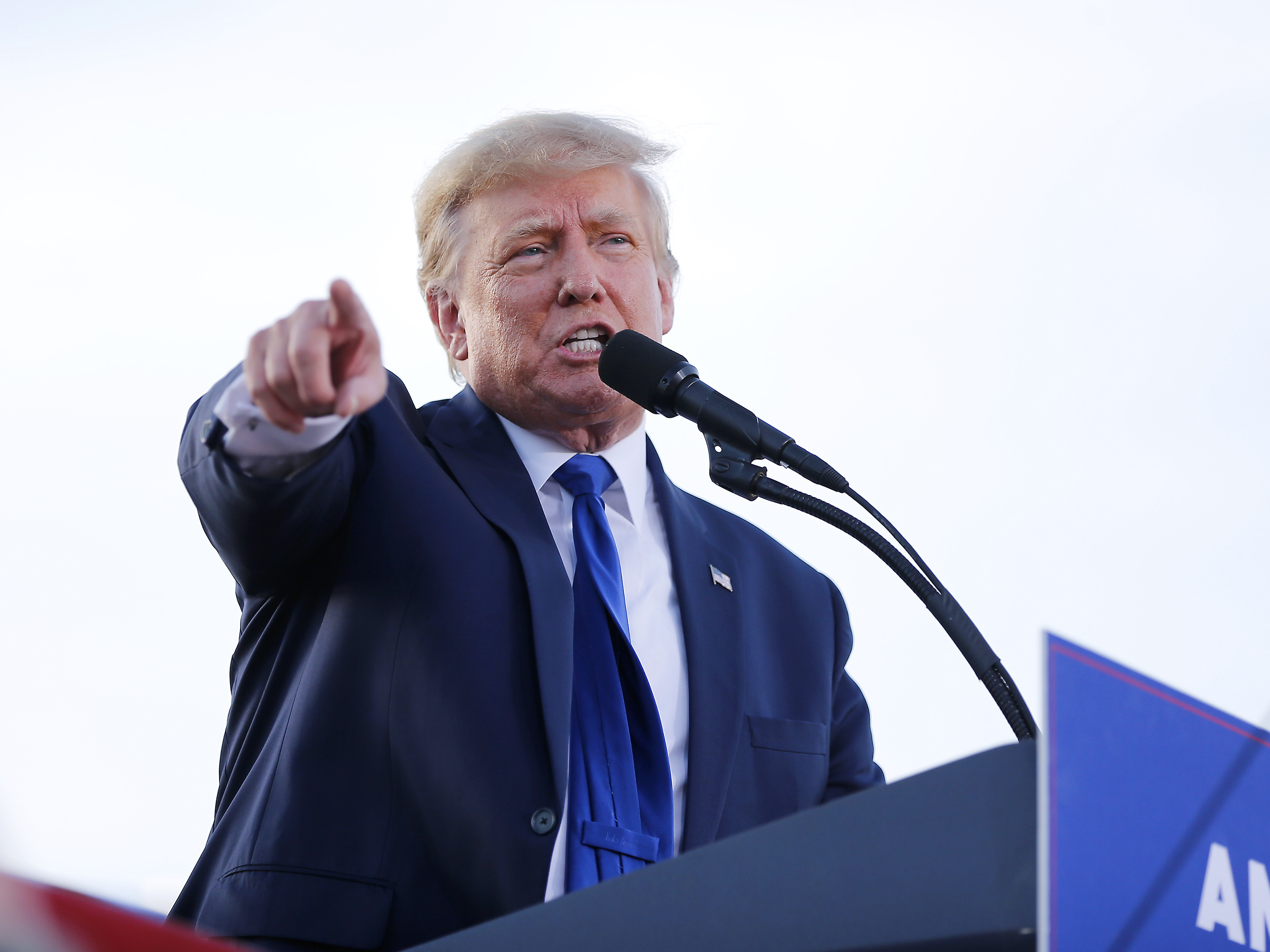 caption: Former President Donald Trump speaks at a rally at the Delaware County Fairgrounds on April 23 in Delaware, Ohio.