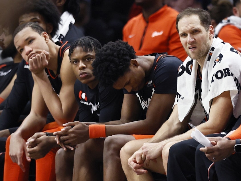 caption: Detroit Pistons forward Kevin Knox II (from left) guard Marcus Sasser, forward Ausar Thompson and forward Bojan Bogdanovic sit on the bench during the fourth quarter of a 118-112 loss to the Brooklyn Nets on Tuesday in Detroit.