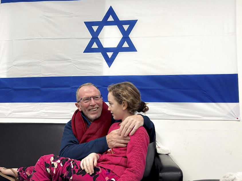 caption: Emily Hand, 9, shown with her father Tom Hand, was one of the Israeli hostage released Saturday by Hamas. Israeli authorities first thought she was killed in the Hamas attack on Oct. 7, but the Israeli military later determined she was alive. She was reunited with her father in the early hours of Sunday.