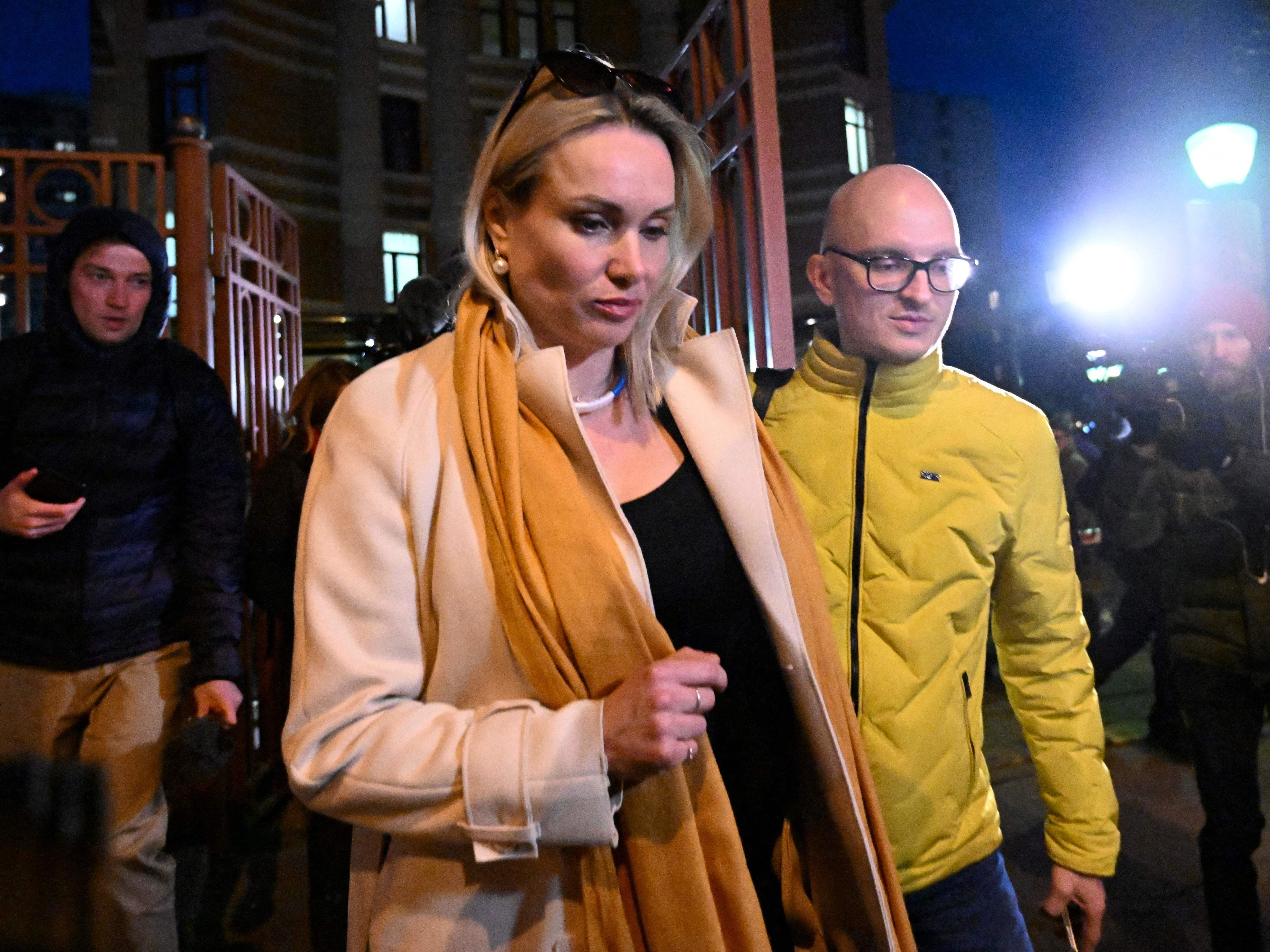 caption: Marina Ovsyannikova, the editor at the state broadcaster Channel One who protested against Russian military action in Ukraine, will reportedly face a fine of between 30,000 and 50,000 rubles when her case is heard on April 14.