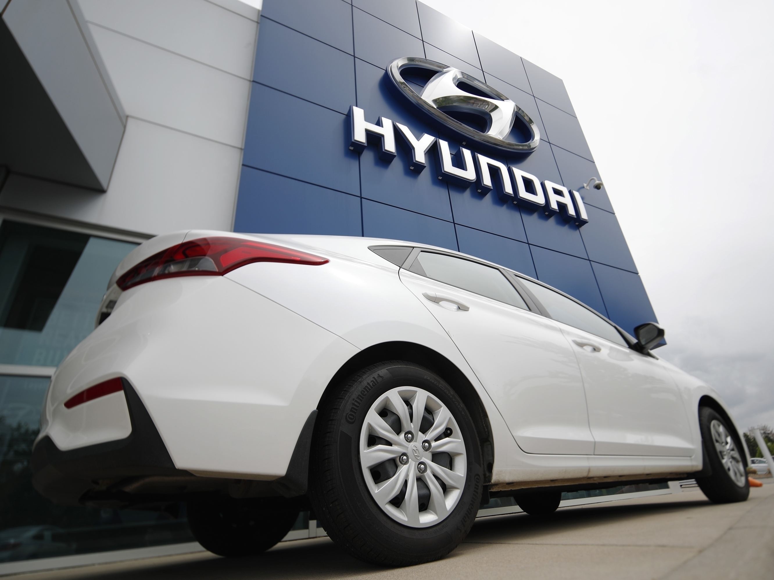 caption: An unsold 2019 Accent sedan sits at a Hyundai dealership in Littleton, Colo. on May 19, 2019. Hyundai is recalling 239,000 cars because the seat belts can explode and injure vehicle occupants.