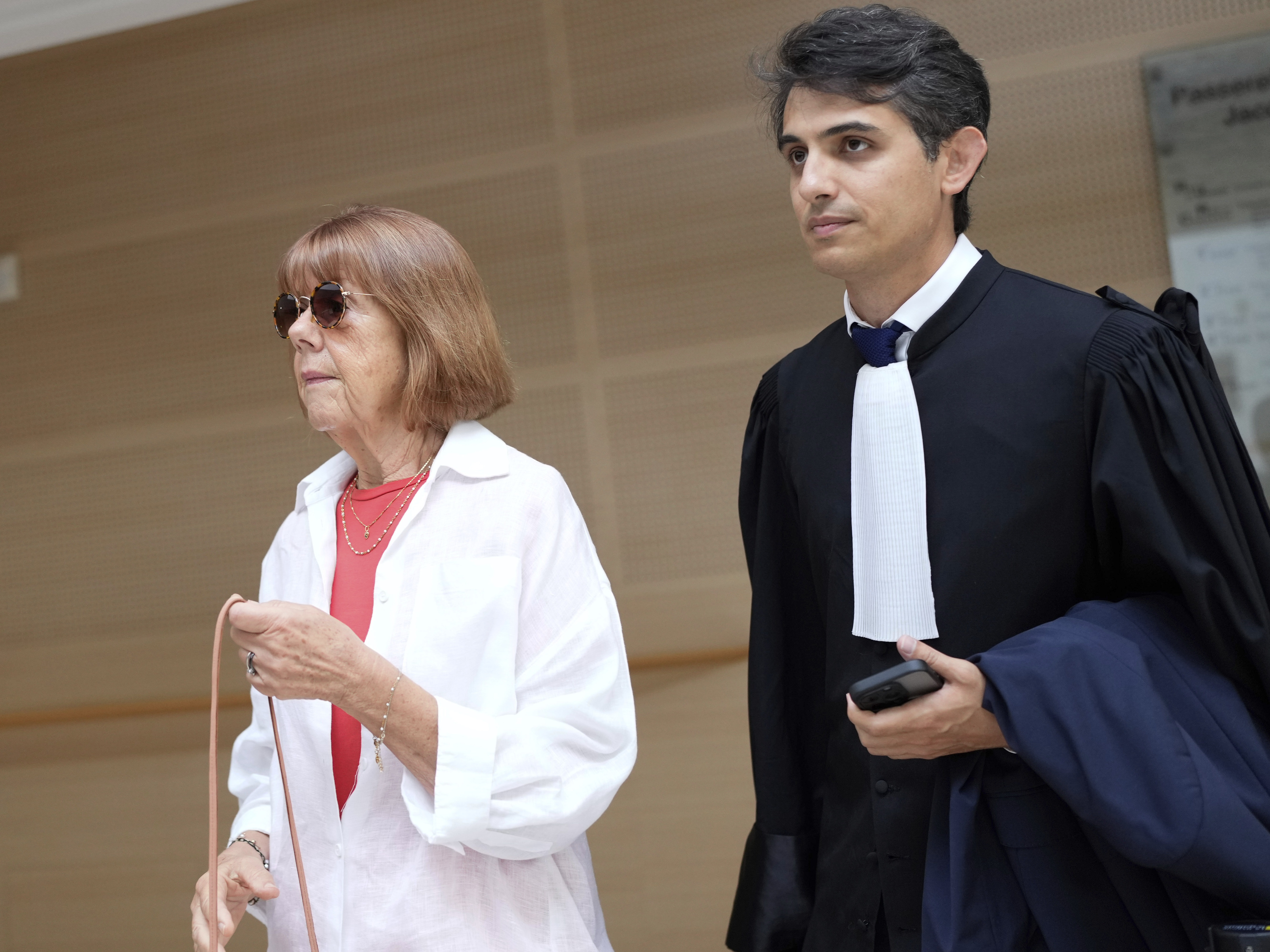 caption: Gisele Pelicot, left, arrives in the Avignon court house, in Avignon, southern France, Thursday, Sept. 5, 2024.