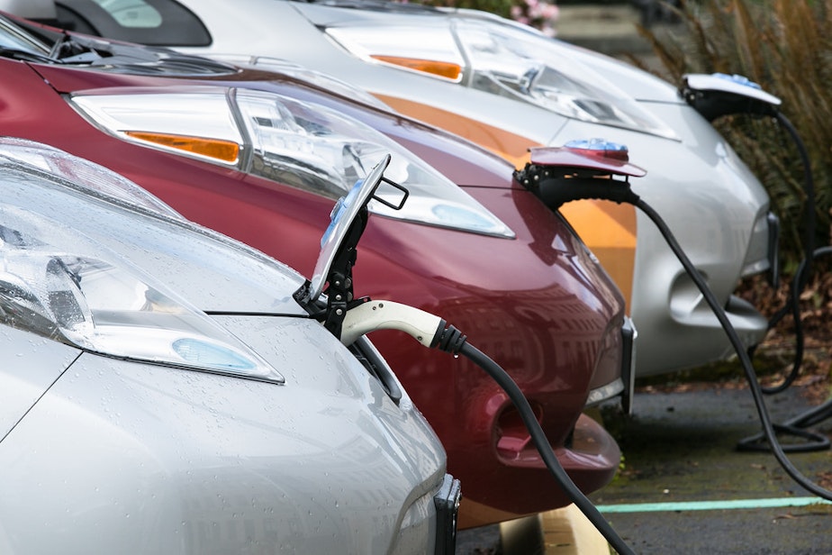 caption: Electric vehicles charging on the state Capitol campus in Olympia, Washington.