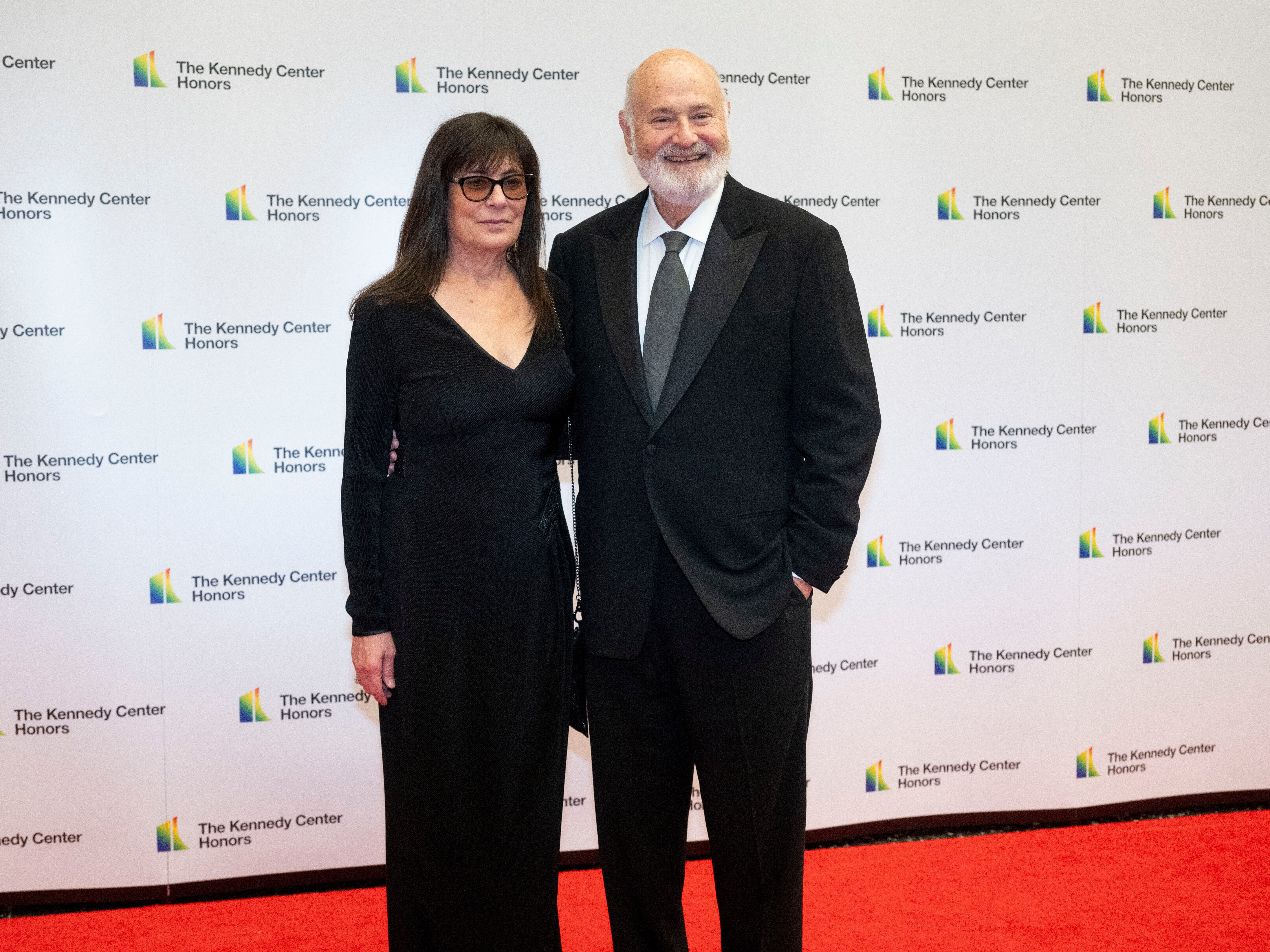caption: Rob Reiner and Michele Reiner arrive on the red carpet at the State Department for the Kennedy Center Honors gala dinner, Dec. 2, 2023, in Washington.