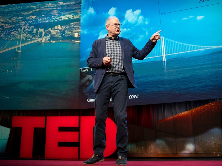 caption: Ian Firth on the TED stage.