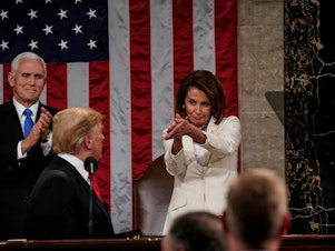 caption: Speaker of the House Nancy Pelosi reacts to a comment by President Trump during his State of the Union address on Tuesday.
