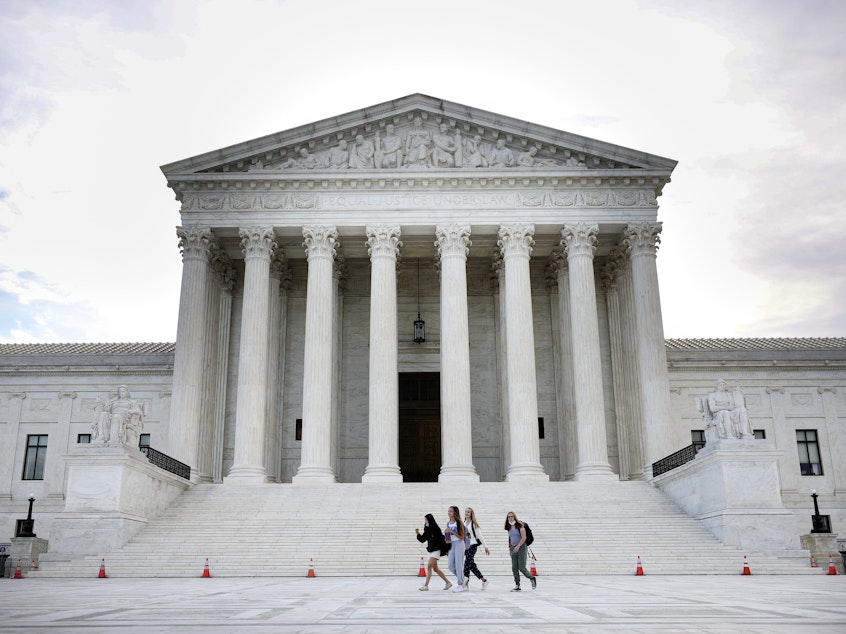 caption: The U.S. Supreme Court is seen on Oct. 5, 2021 in Washington, D.C. The court is holding in-person arguments for the first time since the start of the COVID-19 pandemic.