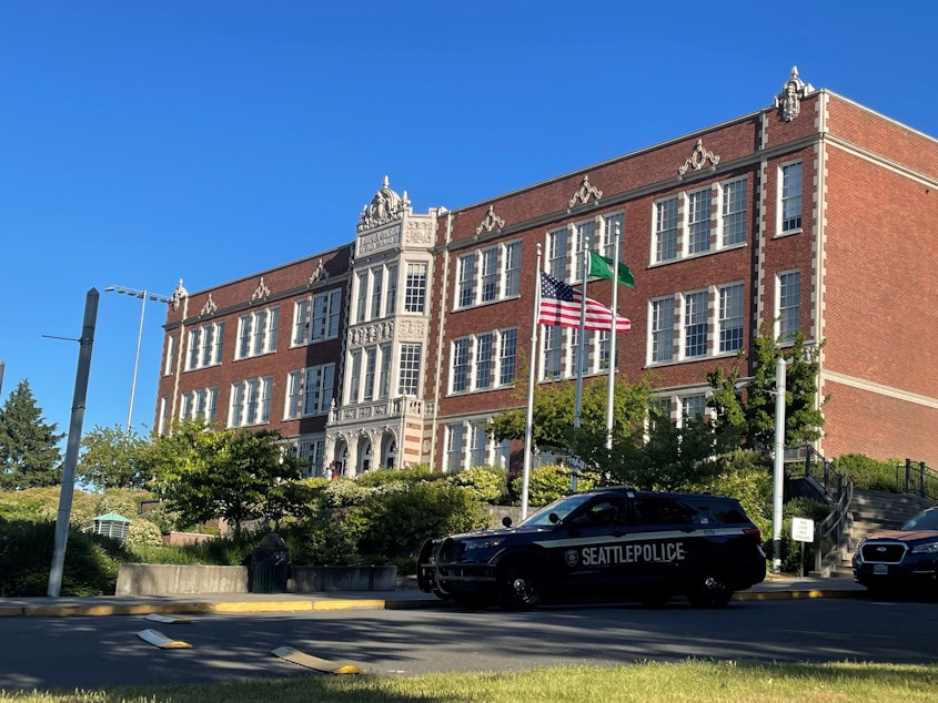 caption: More police are patrolling Garfield High School after a recent wave of gun violence near the school in Seattle's Central District. Parents met at the school Monday to talk about solutions.