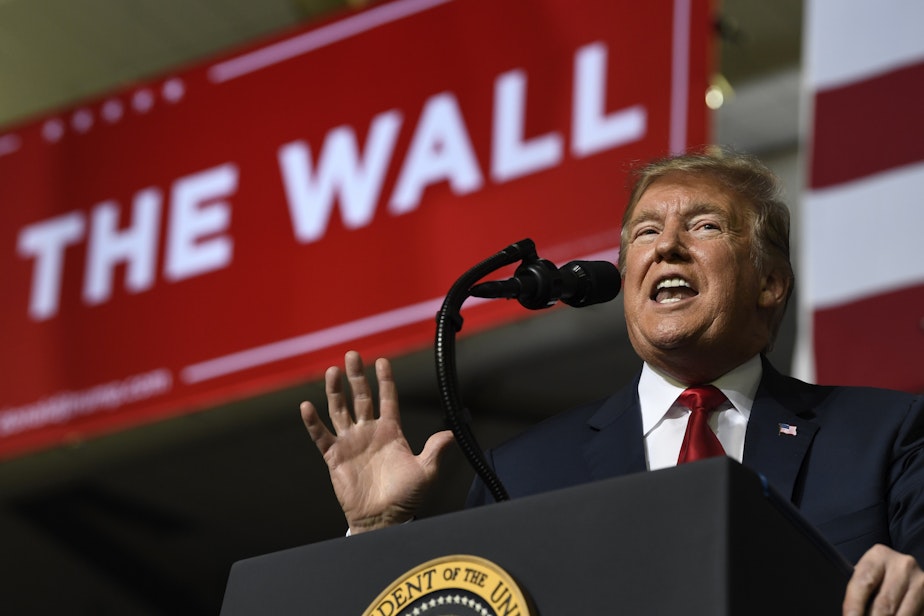 caption: President Donald Trump speaks during a rally in El Paso, Texas, Monday, Feb. 11, 2019. Trump is in Texas to try and turn the debate over a wall at the U.S.-Mexico border back to his political advantage. (Susan Walsh/AP)