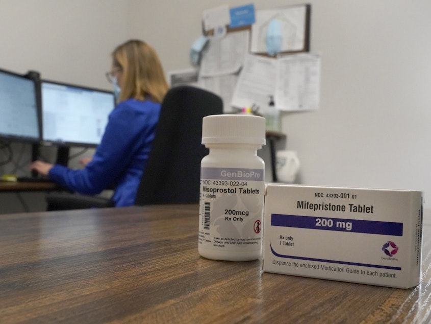 caption: Access to the abortion drug mifepristone could soon be limited by the Supreme Court for the whole country. Here, a nurse practitioner works at an Illinois clinic that offers telehealth abortion.