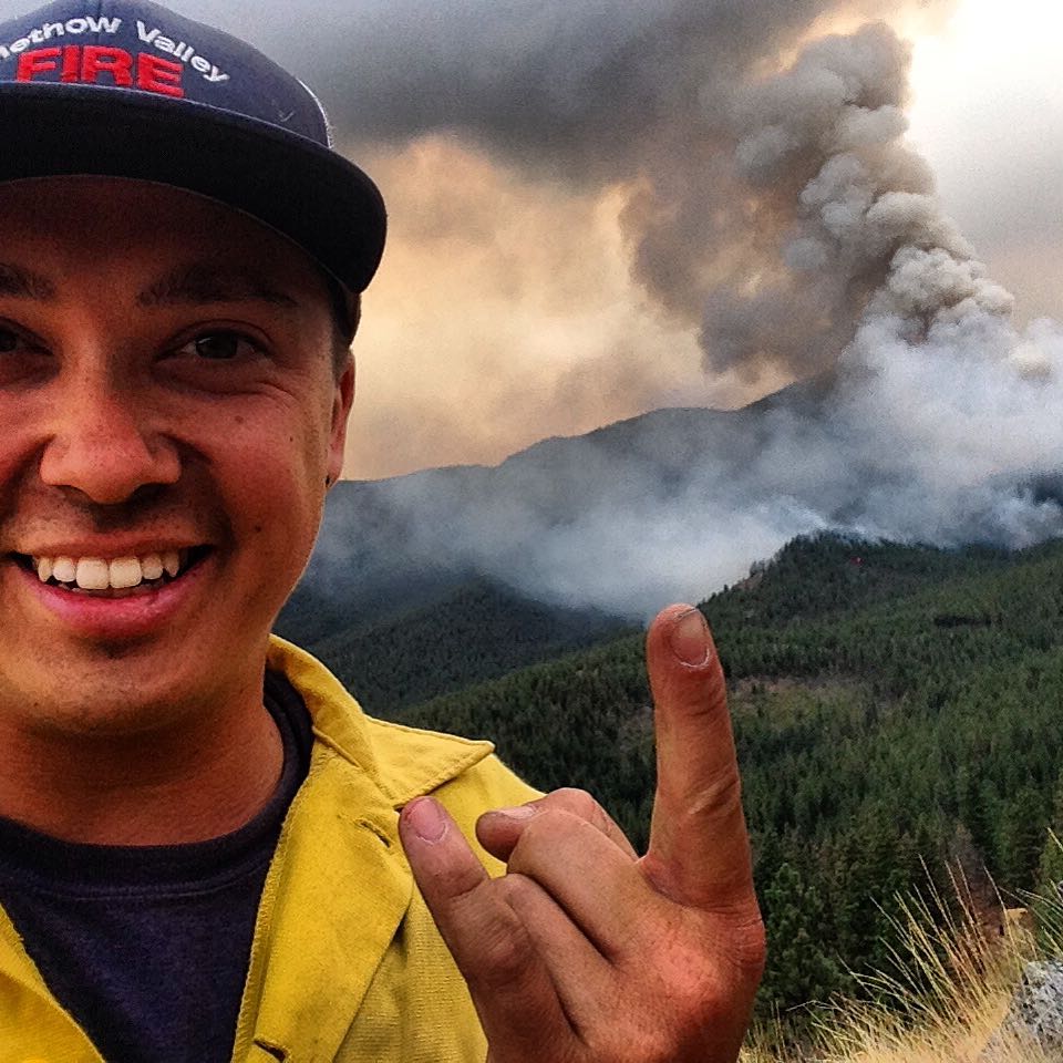 caption: Daniel Lyon is seen this summer, his first season as a firefighter.