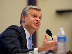 caption: FBI Director Christopher Wray testifies before a House Homeland Security Committee hearing on Thursday.