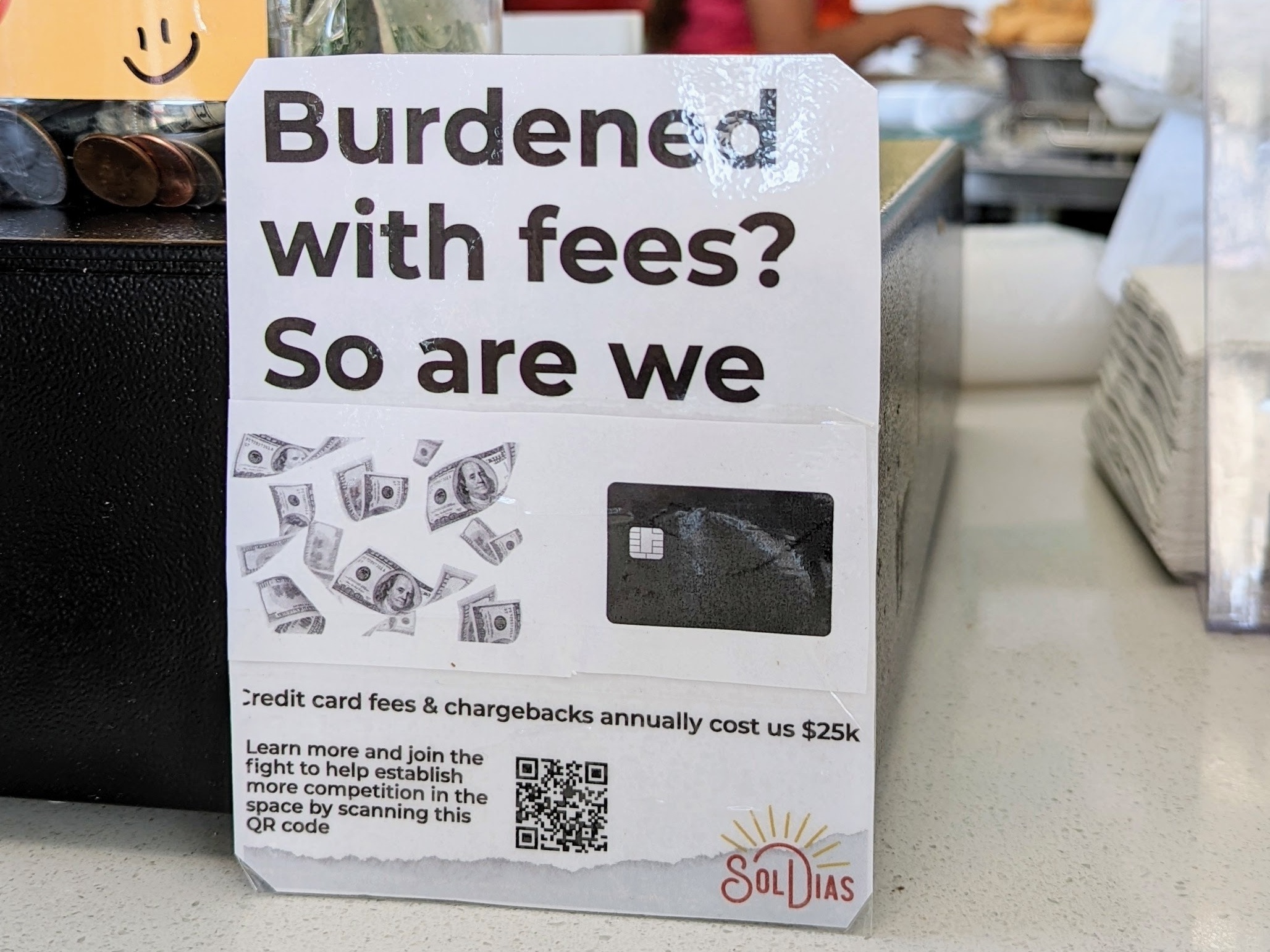 caption: Customers at SolDias ice cream shops in Texas are encouraged to pay with cash instead of credit cards. Owner Victor Garcia is backing a legislative effort that aims to lower credit card processing fees through increased competition.