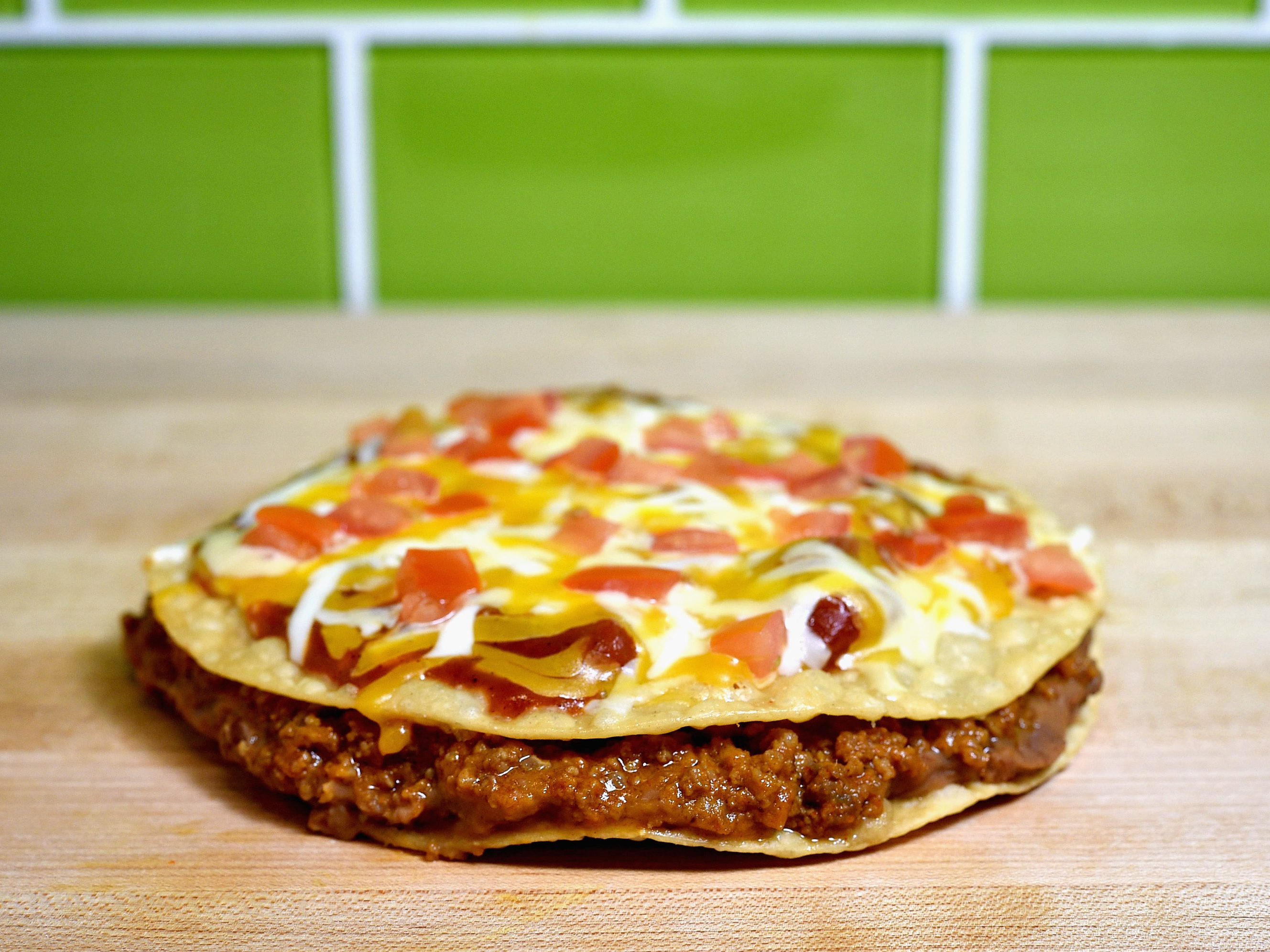 caption: Taco Bell axed the Mexican pizza from its menu to make way for new items, but popular demand brought it back.