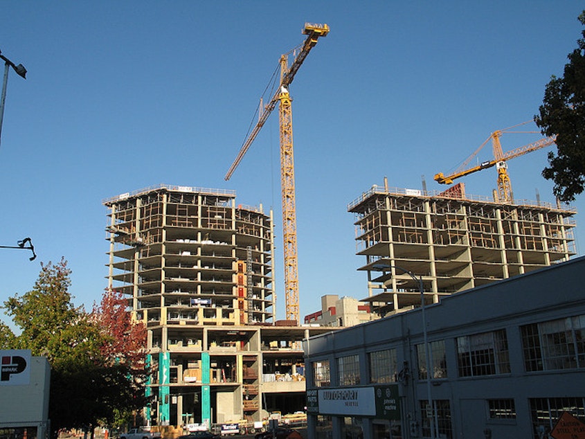 caption: Apartment construction in Seattle.