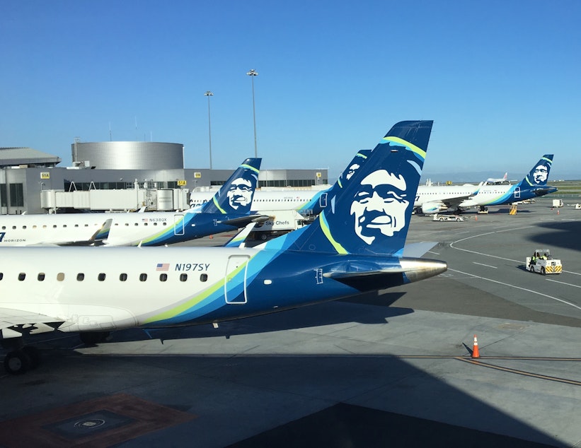 caption: Alaska Airlines jets at San Francisco International Airport