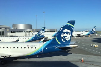 caption: Alaska Airlines jets at San Francisco International Airport