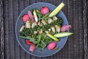 caption: Chef Kathy Gunst’s chicken and couscous bowl with green cilantro-scallion sauce. (Robin Lubbock/WBUR)
