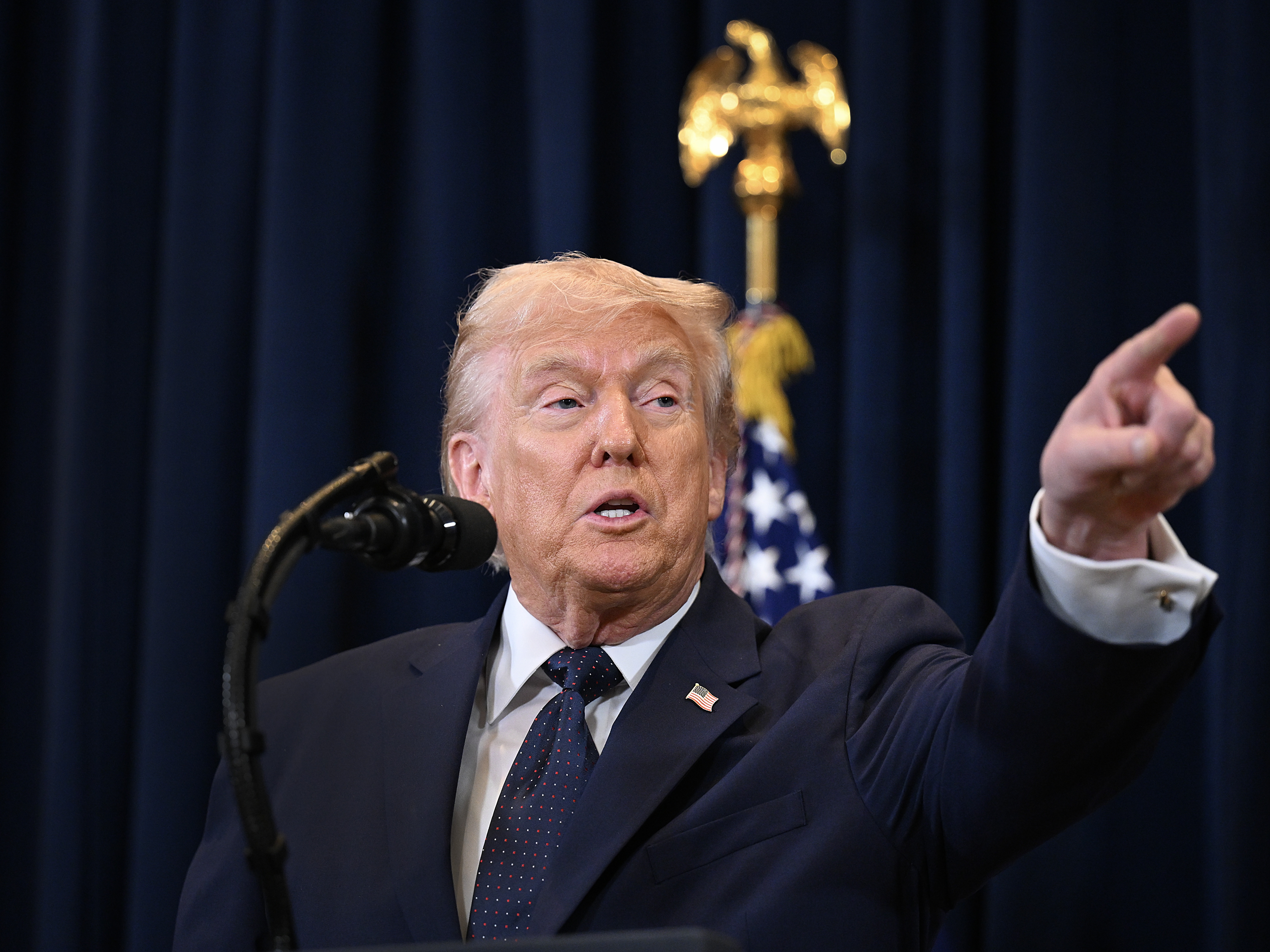 caption: President Trump speaks to reporters during a news conference at Trump National Doral Miami on March 9 in Doral, Fla.