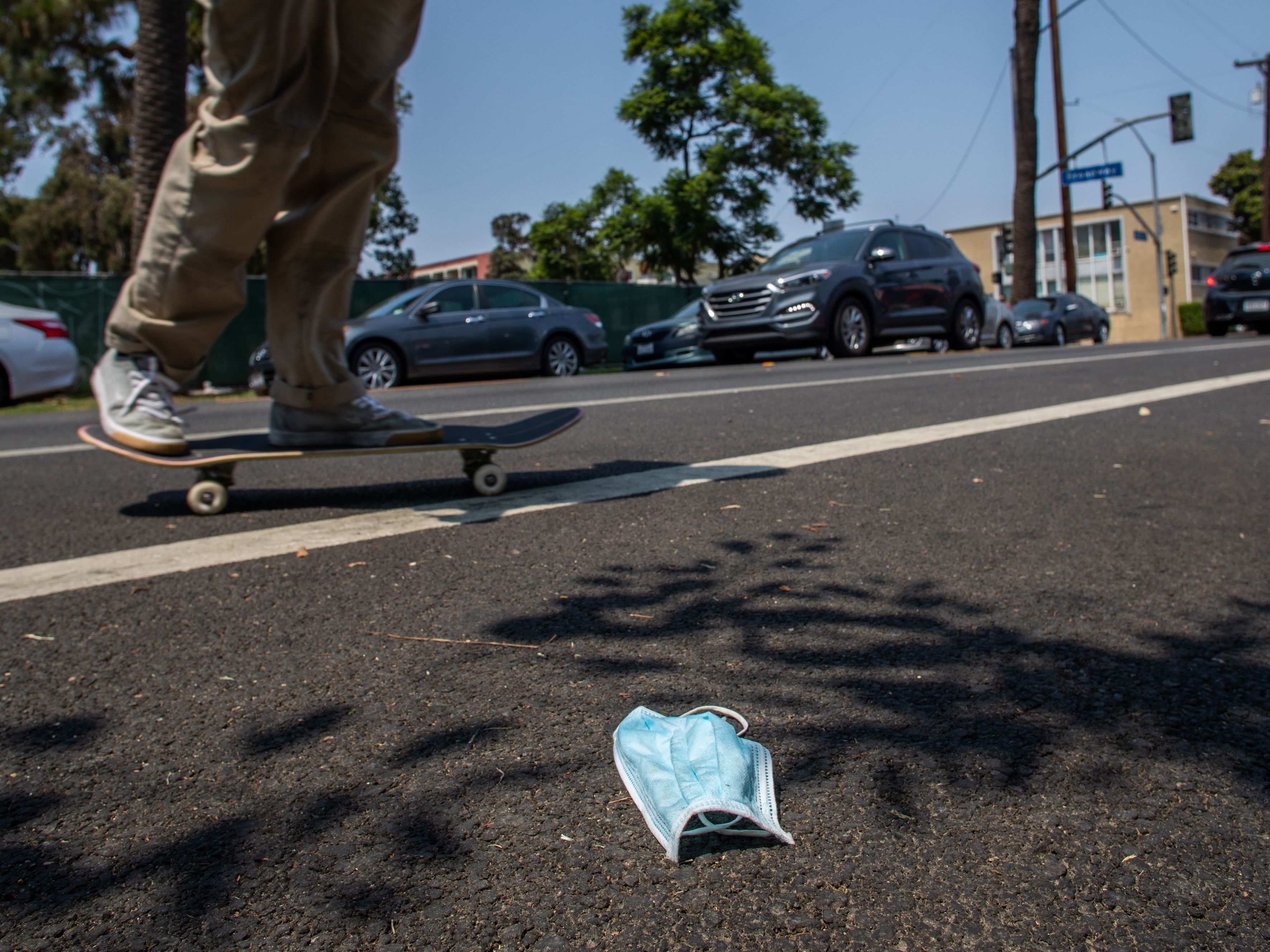 caption: The Centers for Disease Control and Prevention says fully vaccinated adults don't need to wear masks in most situations. Some states responded cautiously and have yet to implement those new guidelines, while others have.