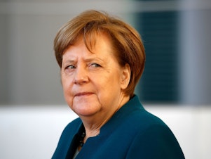 caption: German Chancellor Angela Merkel has had to readjust her government's approach to trans-Atlantic relations.