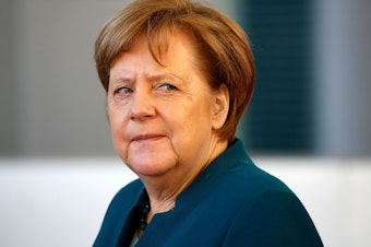caption: German Chancellor Angela Merkel has had to readjust her government's approach to trans-Atlantic relations.