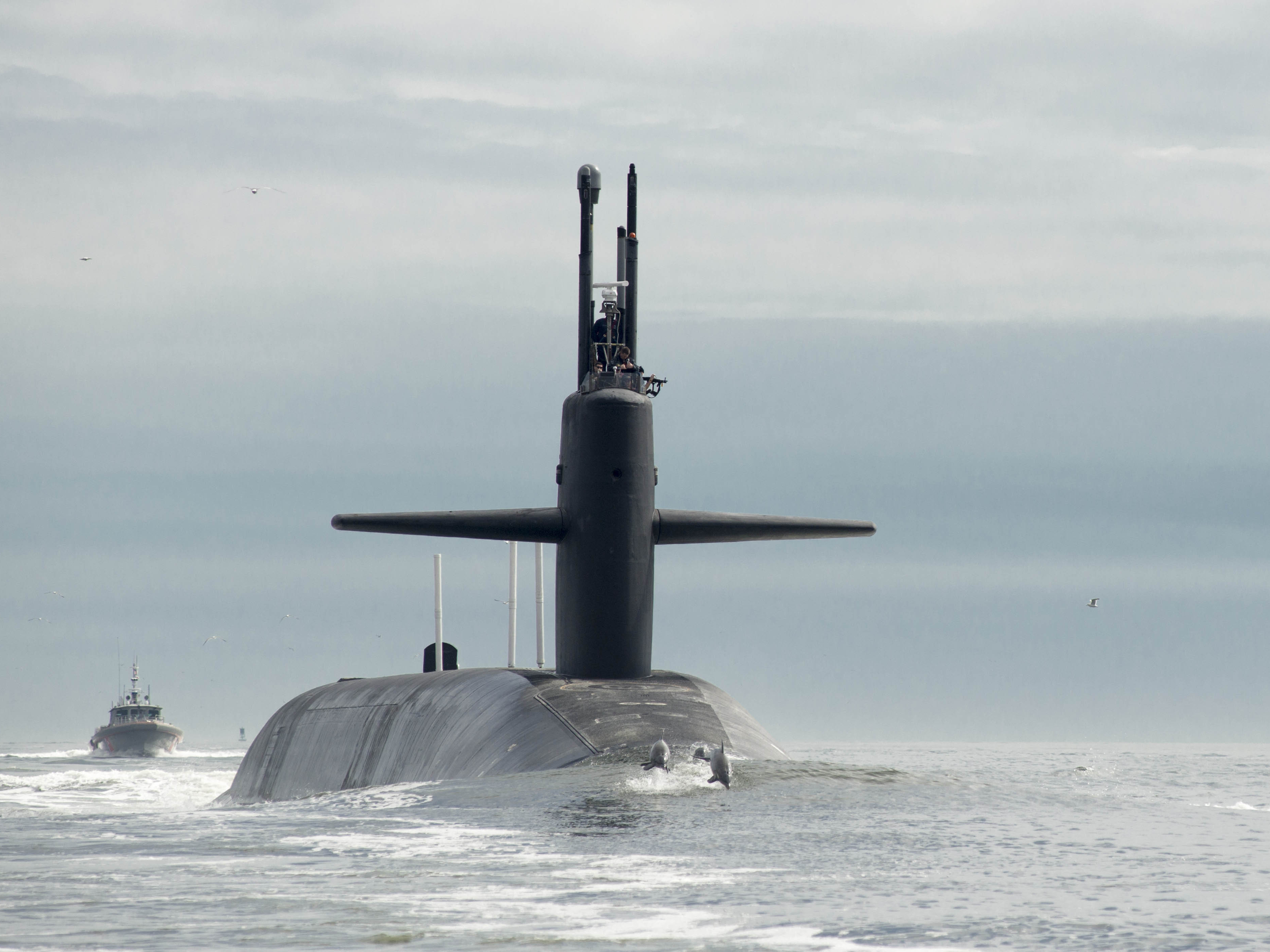 caption: The Ohio-class ballistic missile submarine USS Tennessee has reportedly gone on patrol carrying the new nuclear weapons.