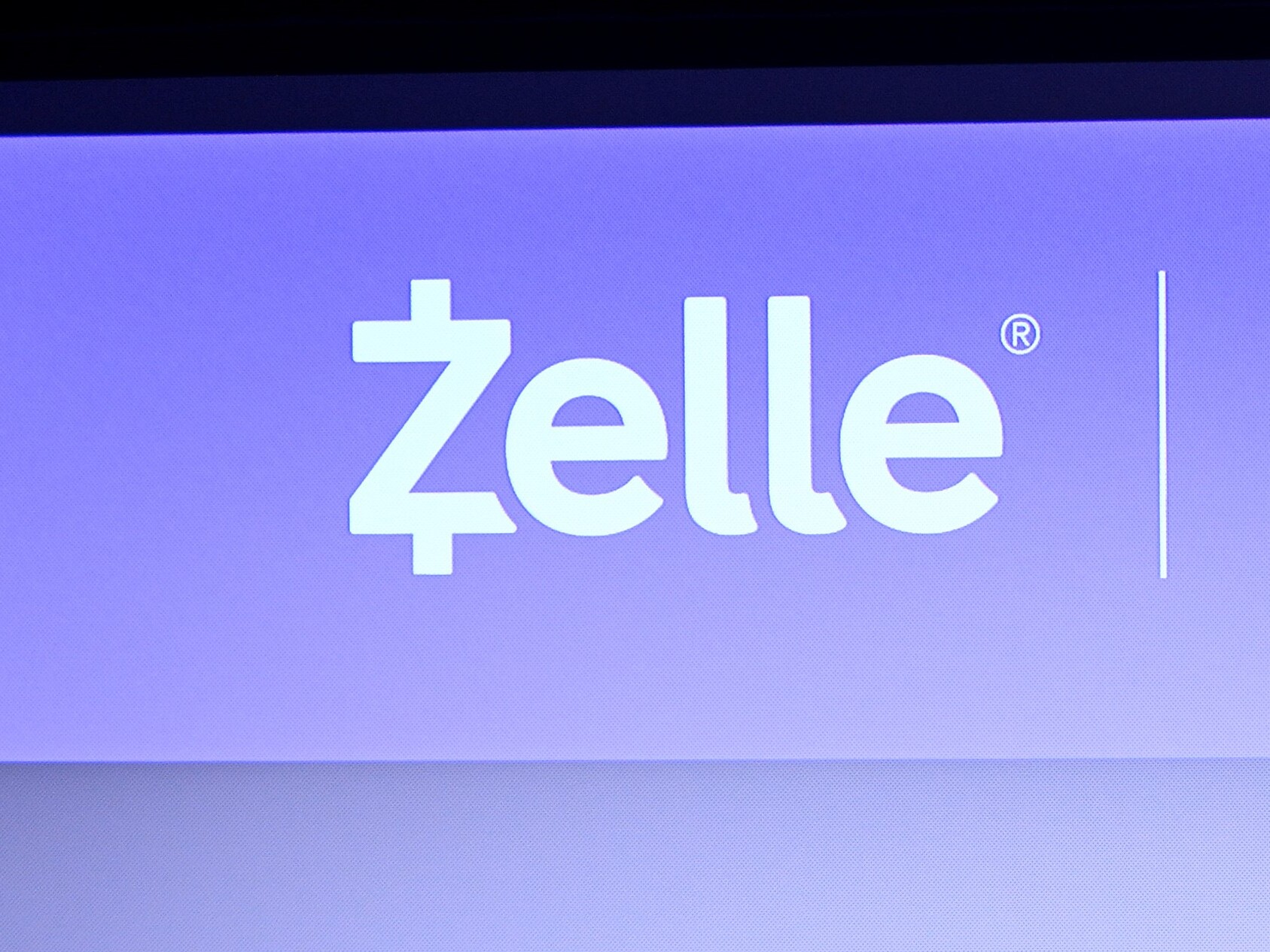 caption: The payment network Zelle and three of its owner banks was sued Friday by the Consumer Financial Protection Bureau.