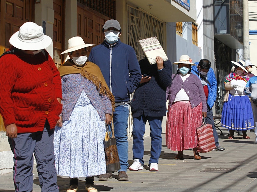 caption: People in the Andean city of Puno, Peru, lined up earlier this month to withdraw funds from their pensions. The World Food Programme says the number of people experiencing severe  food insecurity in Latin America and the Caribbean could quadruple.