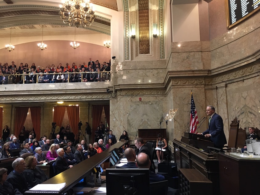 caption: Climate change topped Gov. Jay Inslee's list of priorities in his 2019 State of the State speech.