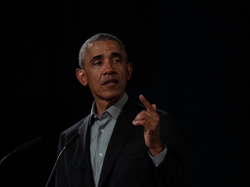 caption: Former President Barack Obama, pictured at a town hall in Berlin in April 2019, has released a statement on the death of George Floyd, who died in police custody in Minnesota.