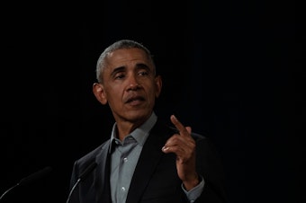 caption: Former President Barack Obama, pictured at a town hall in Berlin in April 2019, has released a statement on the death of George Floyd, who died in police custody in Minnesota.