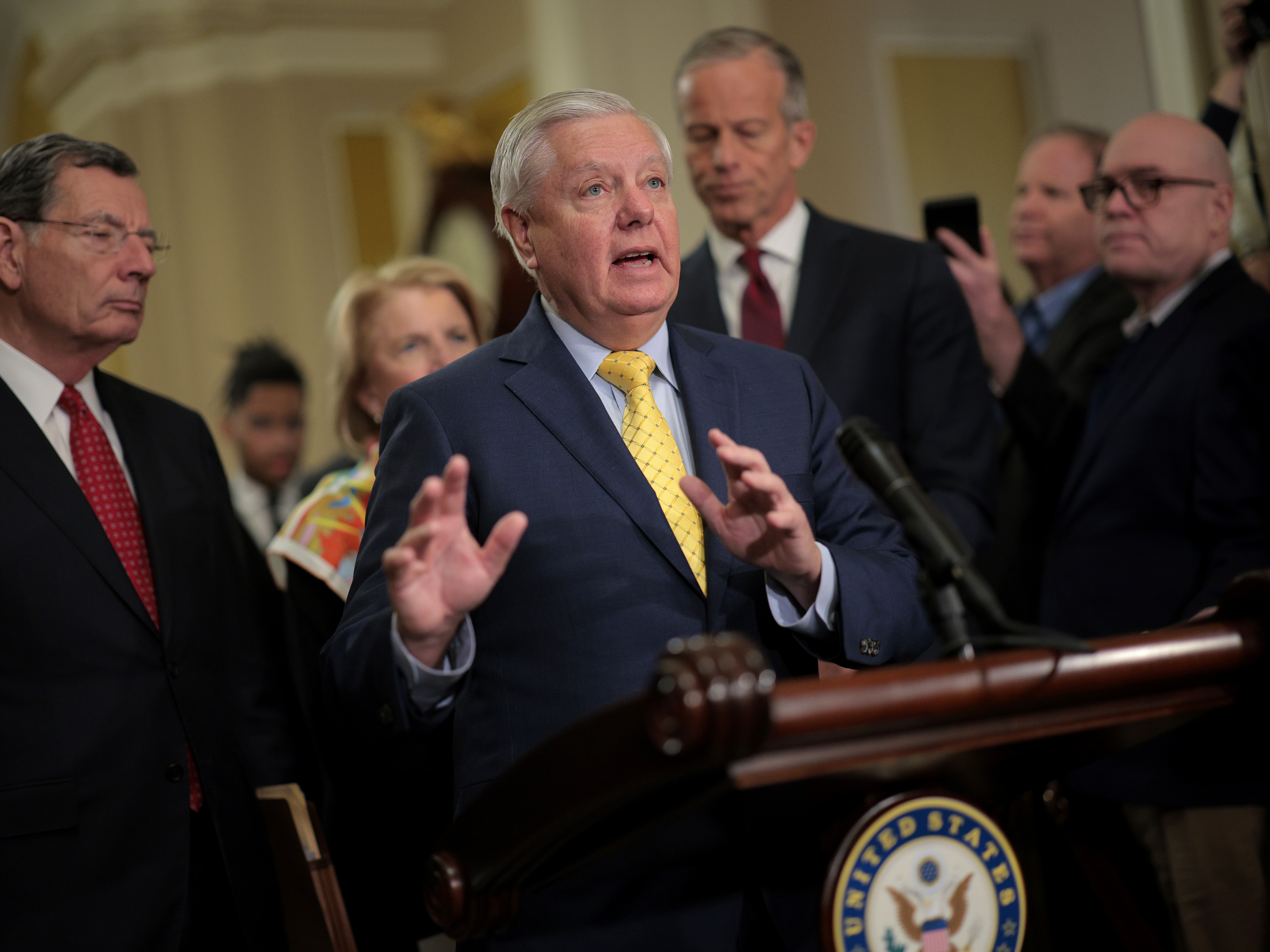 caption: Senate Budget Committee Chairman Lindsey Graham, R-S.C., told reporters in the Capitol on Tuesday that he is moving forward with a budget proposal that would allow Republicans to pass much of President Trump's agenda without the threat of a filibuster.